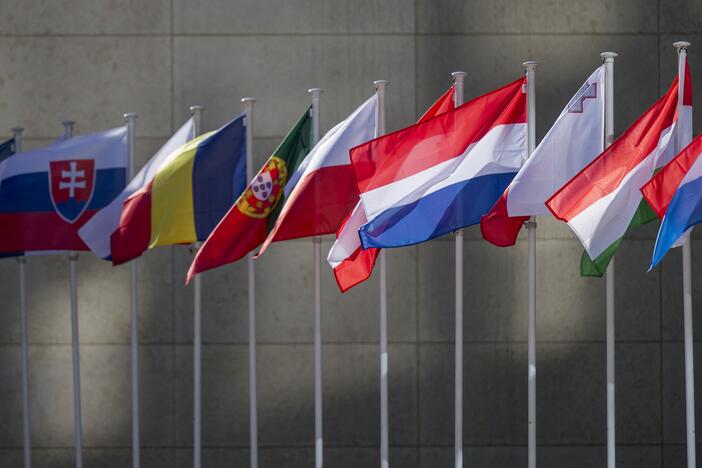 Flags of EU countries fly at the European Council building in Luxembourg on April 7.