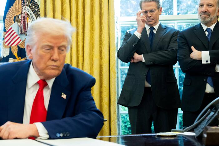 Treasury Secretary Scott Bessent and Commerce Secretary Howard Lutnick with President Trump in the Oval Office on Wednesday.