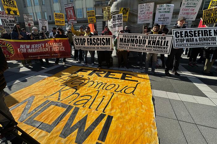 Pro-Palestinian protesters demanding the release of Columbia University graduate student Mahmoud Khalil stand outside his immigration court hearing in Newark, N.J., on Friday, March 28, 2025.