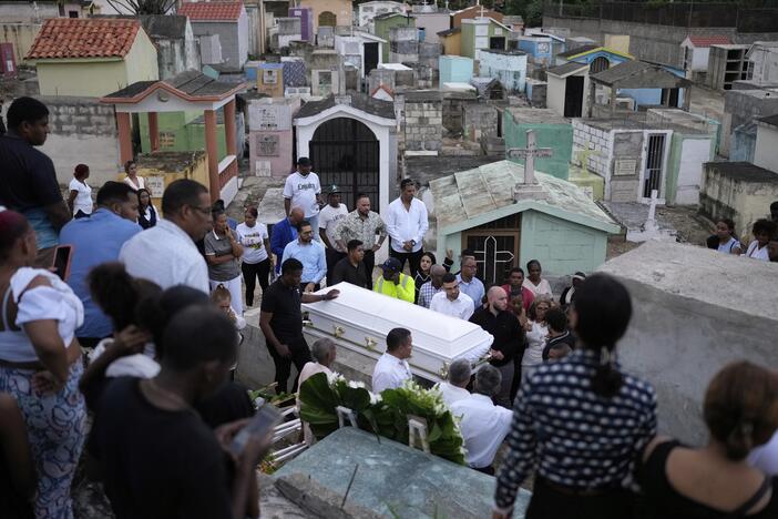 Family and friends attend the funeral of Marilenny Pilarte who died at the Jet Set nightclub when its roof collapsed, in Haina, Dominican Republic on Thursday.