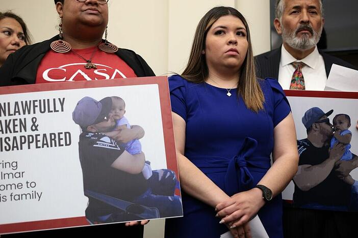 The wife of Kilmar Abrego Garcia, Jennifer Vasquez Sura (center), listens during a news conference to discuss her husband's arrest and deportation on Capitol Hill on April 9.