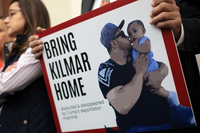 A member of the Congressional Hispanic Caucus holds a picture of Kilmar Abrego Garcia during a news conference to discuss Abrego Garcia's arrest and deportation on April 9, 2025 in Washington, D.C.