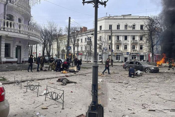 In this photo provided by the Ukrainian Parliament Commissioner for Human Rights Press Service, bodies of the killed residents lie on the ground following a Russian missile attack that killed at least civilia civilians in Sumy, Ukraine, Sunday, April 13, 2025.