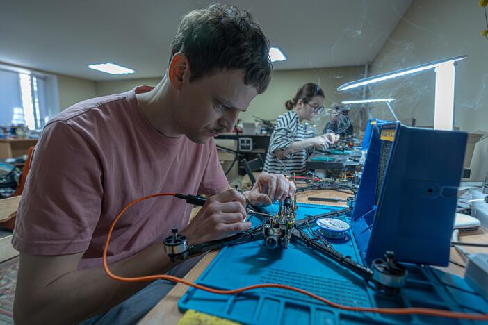 Biophysicist Oleh Halaidych, 34, helps make drones at a workshop in Kyiv. "I think we are all motivated because we see that this is a cheap and accessible way to make weapons," he says. "They kill the enemy and destroy his armored vehicles."