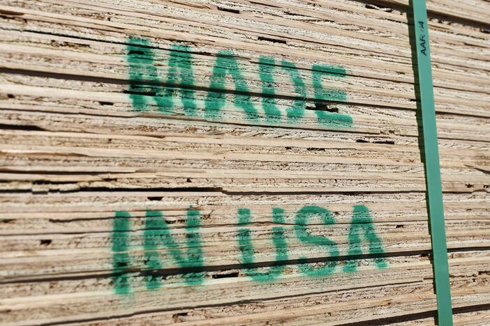 Stacks of U.S. lumber are stamped "Made in USA" and available for sale at Home Depot last month in Pasadena, Calif.