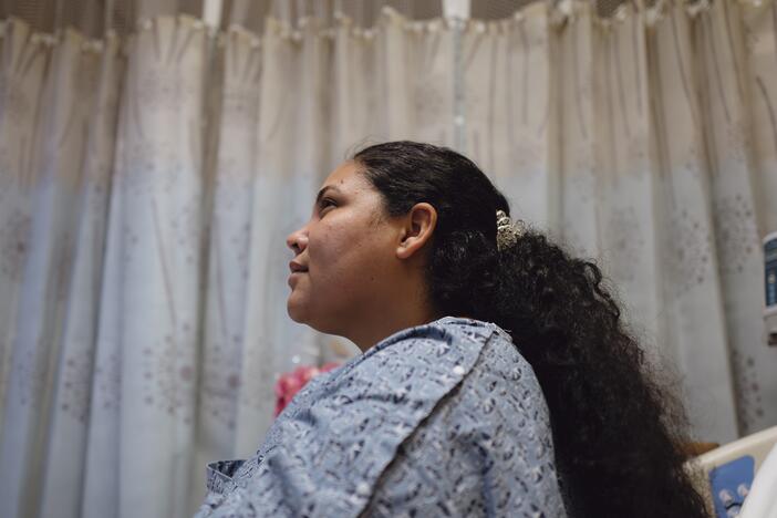 One day before her court hearing, Yasmelin Valazquez is hospitalized at John F. Kennedy Memorial Hospital in Indio, Calif., on April 9, 2025. Zaydee Sanchez/NPR