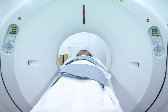CT scans use ionizing radiation to create cross-sectional images of the body, providing more detail than X-rays.
