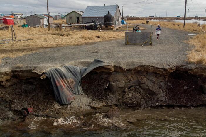 Homes in the Yupik Eskimo Village of Quinhagak on the Yukon Delta in Alaska are threatened by shoreline erosion as climate change makes the planet warmer. More than 22 tribes and nonprofits in the U.S., including Alaska, have had millions of dollars in federal funds for infrastructure projects frozen. Some of those projects were meant to help address the impacts of climate change.
