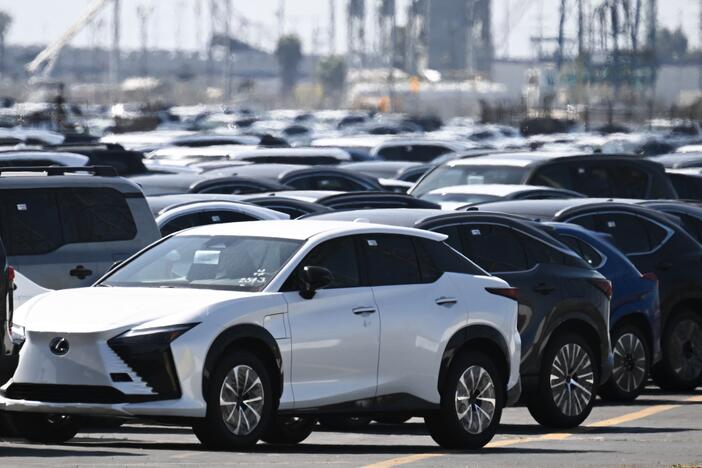 Toyota and Lexus cars unloaded from ships sit parked at the Toyota Logistics Services Inc. automotive processing terminal at the Port of Long Beach in Long Beach, Calif., on April 10.