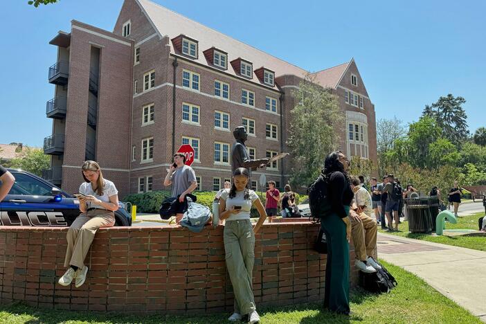 Florida State University students wait for news amid an active shooter incident at the school's campus in Tallahassee, Fla., on Thursday.