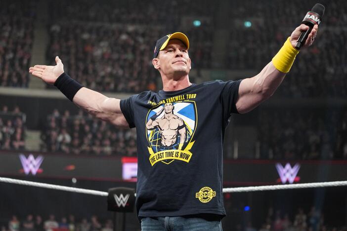John Cena addresses the crowd during <em>Monday Night RAW</em> at The OVO Hydro on March 24 in Glasgow, Scotland.