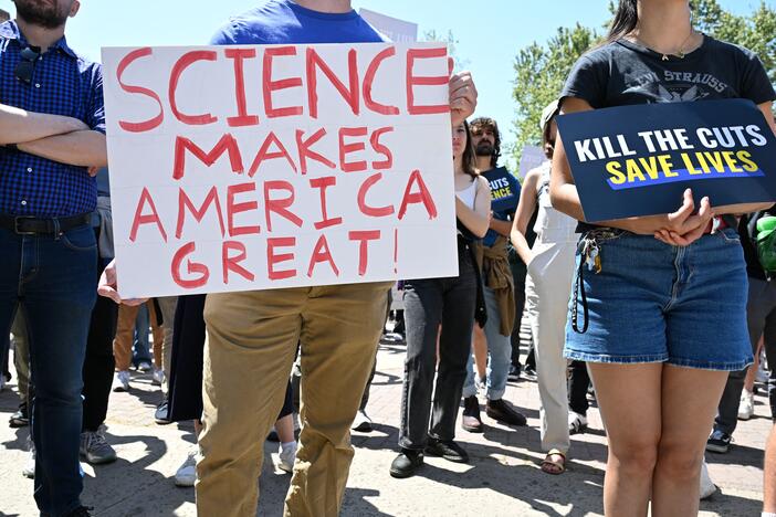 Students, researchers and demonstrators rally during a protest against the Trump administration's funding cuts on research, health and higher education at the University of California Los Angeles on April 8.