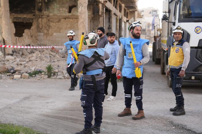 The White Helmets search for unexploded ordnance in Homs, Syria, on Jan. 29.