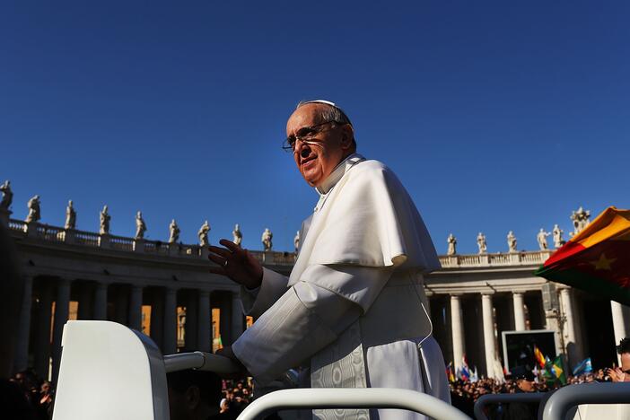Pope Francis drives through the crowds during the Inauguration Mass for the Pope in St. Peter's Square on March 19, 2013, in Vatican City, Vatican. The mass was held in front of an expected crowd of up to one million pilgrims and faithful who filled the square and the surrounding streets to see the former Cardinal of Buenos Aires officially take up his role as pontiff.