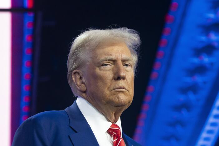 U.S. President-elect Donald Trump looks on during Turning Point USA's AmericaFest at the Phoenix Convention Center on Dec. 22, 2024, in Phoenix. The annual four day conference geared toward energizing and connecting conservative youth hosts some of the country's leading conservative politicians and activists.