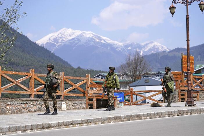 Security personnel patrol a street the morning after militants indiscriminately opened fire on tourists near Pahalgam in Indian-controlled Kashmir, April 23.