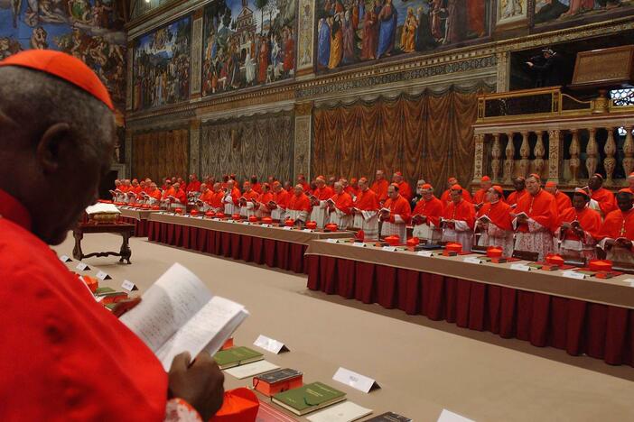 Cardinal electors attend the papal conclave inside the Sistine Chapel on April 18, 2005.