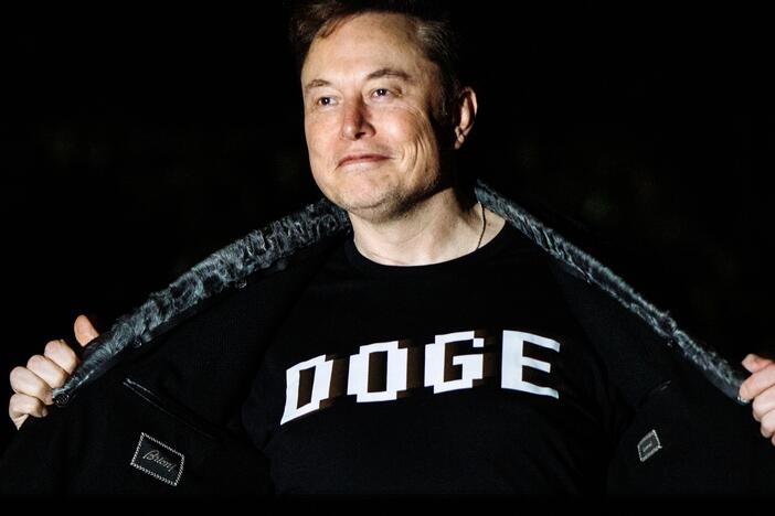 Elon Musk walks to the White House after landing in Marine One on the South Lawn with U.S. President Donald Trump on March 9. Musk's Department of Government Efficiency has asked for major cuts to the Millennium Challenge Corporation, a foreign aid agency started by George W. Bush.
