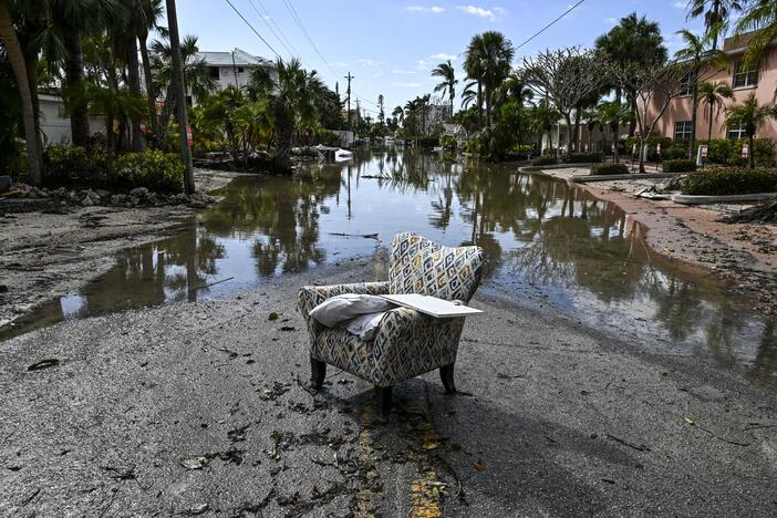 A flooded street with debris in the aftermath of Hurricane Milton, in Siesta Key, Fla., on October 10, 2024. The monster weather system sent tornadoes spinning across the state and flooded swaths of the Tampa Bay area after the storm rapidly intensified to a top-of-scale category 5 major hurricane.