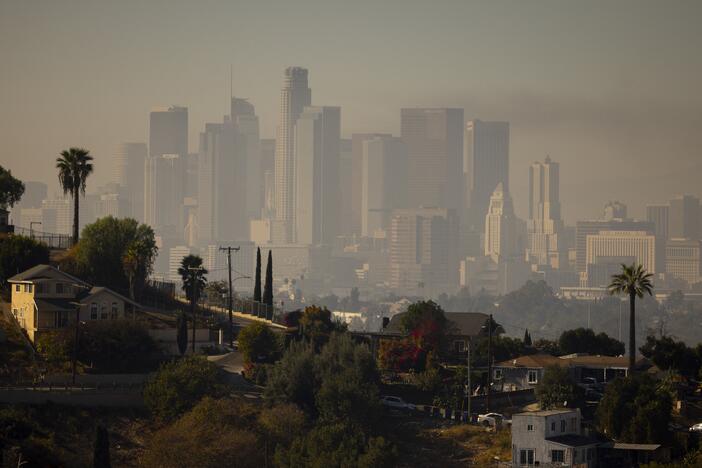 A layer of smog lingers above downtown Los Angeles in 2024. Millions of Americans are still breathing in unhealthy air, despite long-term progress toward cleaning up many sources of pollution, according to the 2025 State of the Air report.