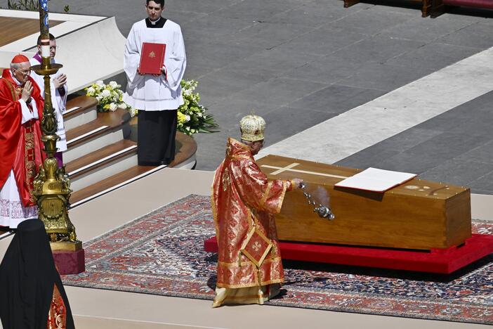 Youssef Absi, Patriarch of Antioch and All the Orient, of Alexandria and of Jerusalem and head of the Melkite Greek Catholic Church, blesses the coffin during the funeral of Pope Francis in St. Peter's Square on Saturday in Vatican City.