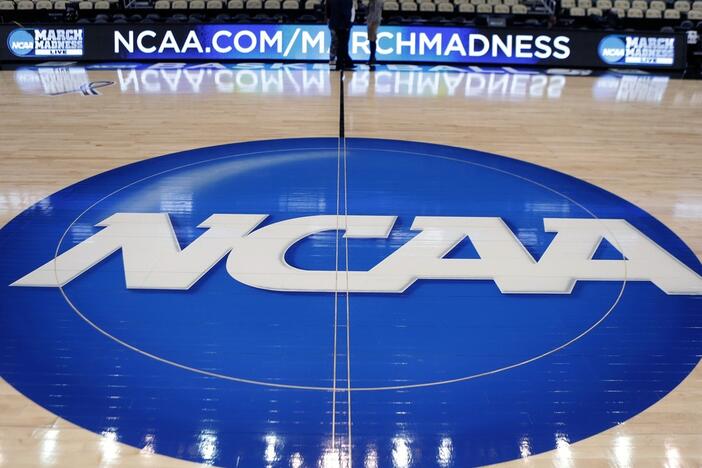The NCAA logo is displayed in 2015 at center court at The Consol Energy Center in Pittsburgh.