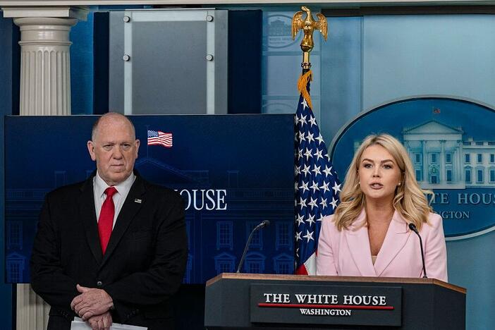 Press Secretary Karoline Leavitt (right) speaks as border czar Tom Homan looks on during a White House briefing on Monday.