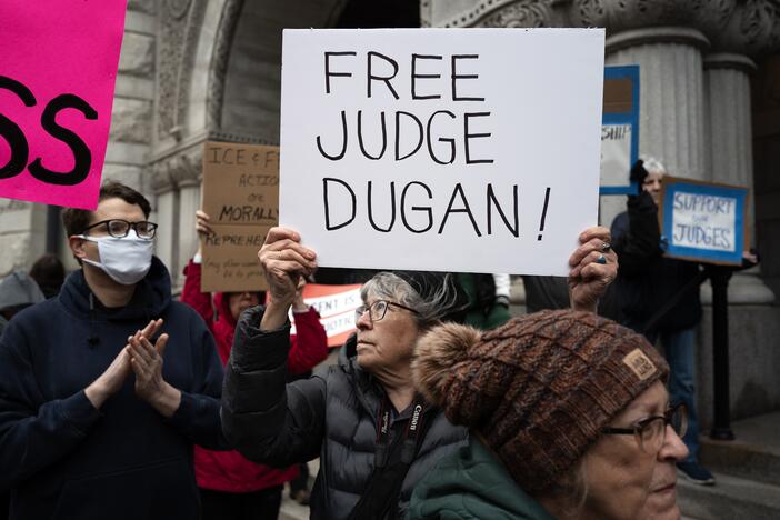 Demonstrators protest in front of the federal courthouse where Milwaukee County Circuit Judge Hannah Dugan appeared in front of a judge after being arrested by the FBI as she arrived for work this morning at the Milwaukee County Courthouse on April 25 in Milwaukee, Wisc.