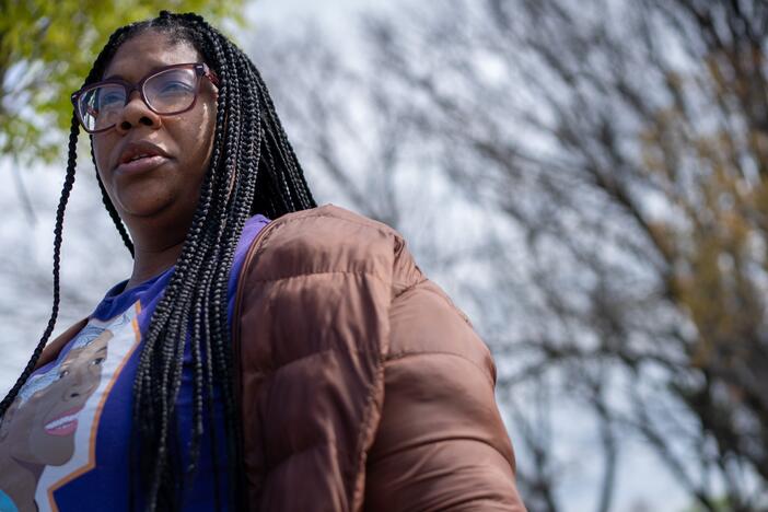 Tracey Malone, executive director of the Sandtown-Winchester Community Collective, stands outside a shuttered recreation center in Baltimore.