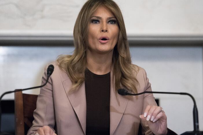 In this Wednesday, Oct. 23, 2019, file photo first lady Melania Trump participates in a roundtable discussion on the opioid crisis, on Capitol Hill in Washington.