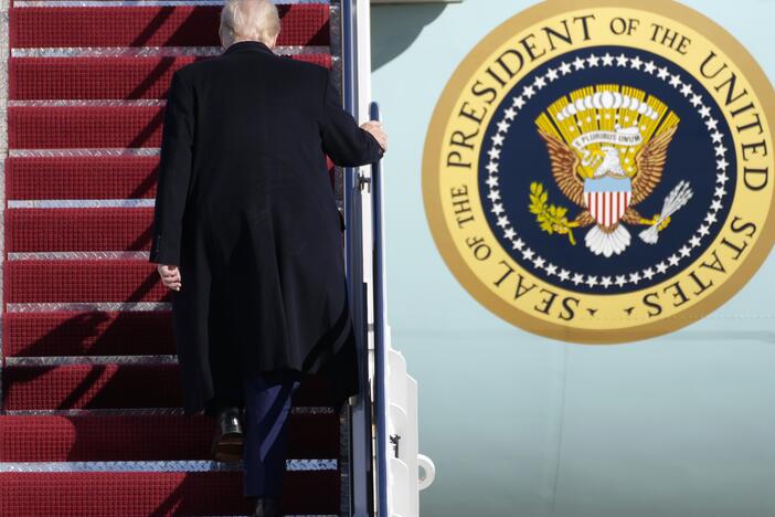 President Trump boards Air Force One in February. He hits the 100-day mark of his presidency this week.