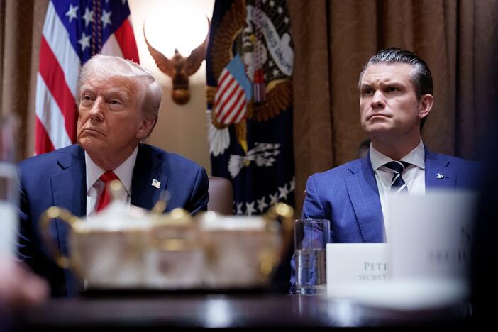 President Trump and Defense Secretary Pete Hegseth appear during a Cabinet meeting at the White House on Feb. 26.