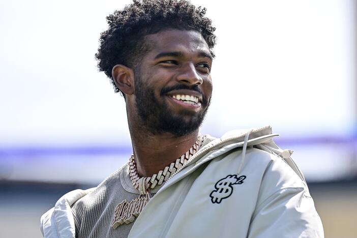 Former Colorado Buffaloes quarterback Shedeur Sanders looks on during a ceremony to retire his jersey before the Black and Gold Spring Game at Folsom Field on April 19 in Boulder, Colo.