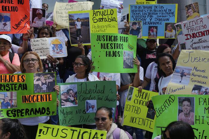 The relatives of Venezuelan migrants in the U.S. who were flown to a prison in El Salvador by the U.S. government protest outside the United Nations building in Caracas, Venezuela, in April. President Trump invoked the 18th-century Alien Enemies Act to deport the men without due process — one of several ways he is attempting to deliver on campaign promises to "launch the largest deportation program of criminals in the history of America."