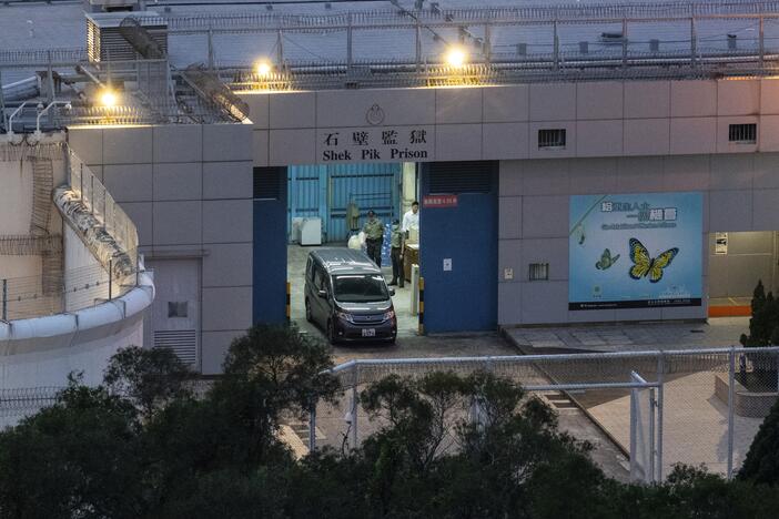 Vehicles believed to be carrying former pro-democracy lawmaker Gary Fan, who was released after four years for his conviction under the national security law, leaves the Shek Pik Prison in Hong Kong on Tuesday.