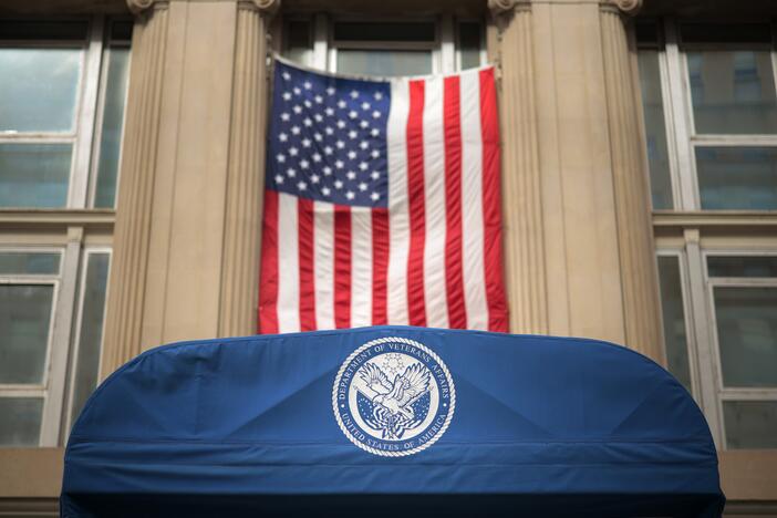 An awning with the Department of Veterans Affairs' seal marks the entrance to the department's headquarters a block from the White House on March 6, 2025 in Washington, D.C.