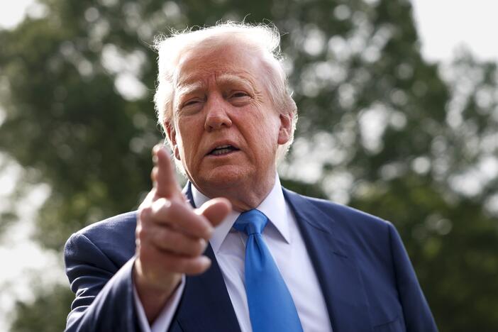 President Trump speaks to the media as he departs the White House on April 25 in Washington, D.C., for Rome to attend the funeral of Pope Francis.
