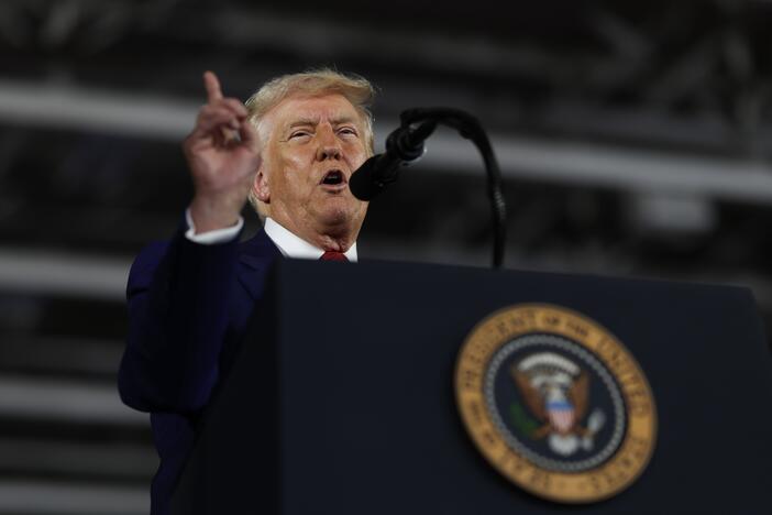 President Trump speaks during a rally at Macomb Community College on in Warren, Mich., on Tuesday to mark his first 100 days in office.