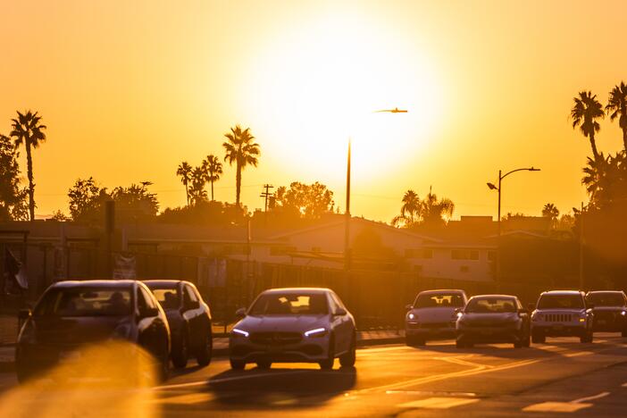 Vehicles drive along the 101 Freeway in Los Angeles, Calif., during a heat wave in October 2024. California has ambitious rules requiring automakers to phase out gas-powered vehicles (except for plug-in hybrids), to combat air pollution and climate change. The Trump administration has vowed to overturn California's stringent standards.