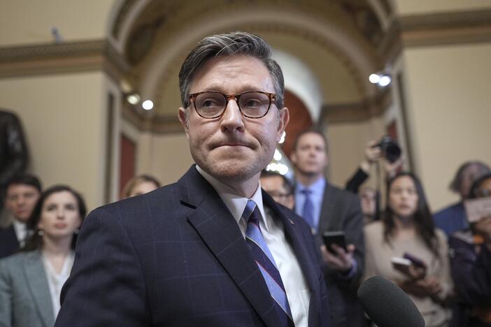 Speaker of the House Mike Johnson, R-La., talks to reporters just after House Republicans narrowly approved their budget framework, at the Capitol in Washington, Thursday, April 10.