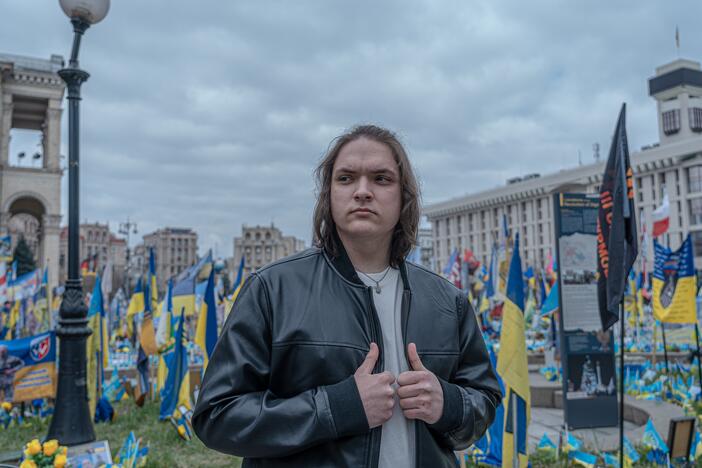 Ivan Sarancha, 18, who left Luhansk after 11 years of living under occupation, stands in front of a memorial for the fallen at Maidan Square — where the pro-Europe uprising known as the "Revolution of Dignity" took place in February 2014 — in Kyiv, Ukraine, on March 26.