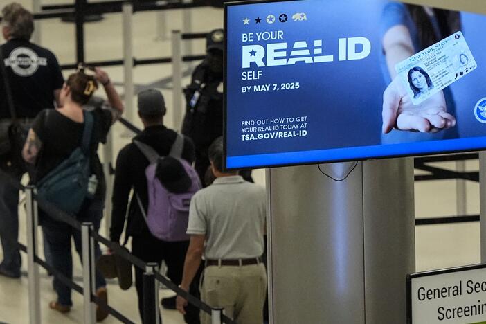 Travelers move through Hartsfield-Jackson Atlanta International Airport ahead of Memorial Day, May 24, 2024, in Atlanta.