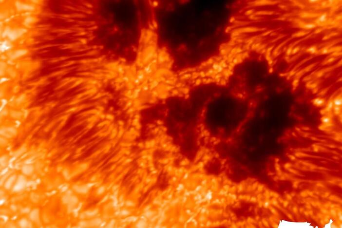 An image captured by the Daniel K. Inouye Solar Telescope in Hawaii shows sunspots on the star's surface.