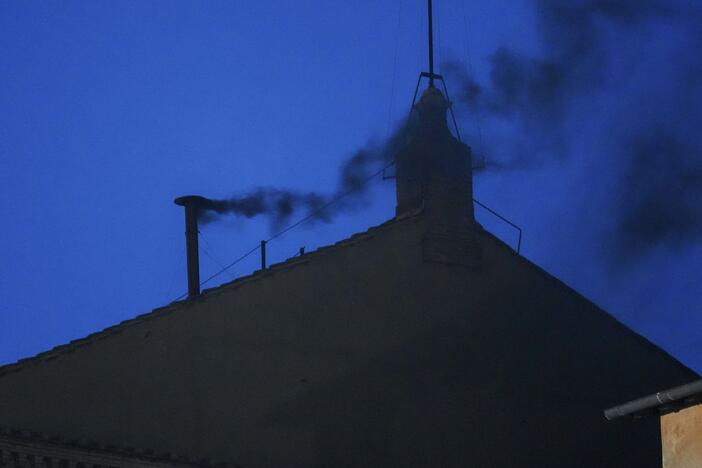 Black smoke billows from the chimney of the Sistine Chapel, where 133 cardinals are gathering on the first day of the conclave, indicating that a successor of the late Pope Francis was not elected, Wednesday.
