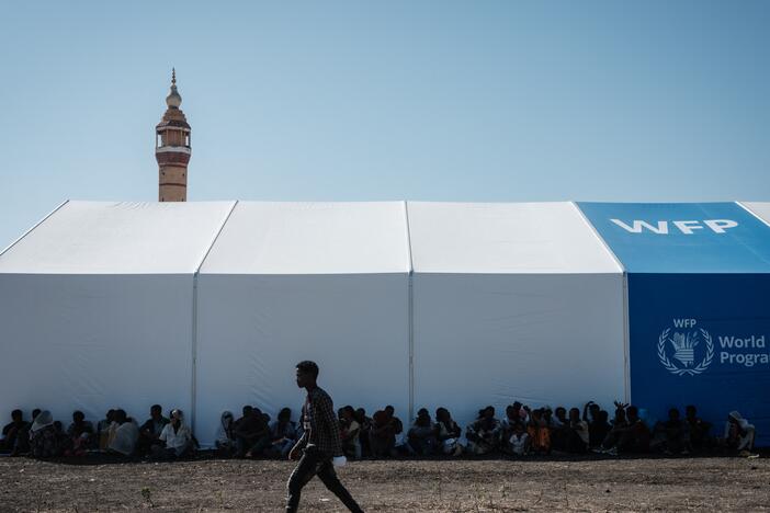 Ethiopian refugees rest in the shadow of a warehouse erected by the World Food Programme near the Ethiopian border in Gedaref, eastern Sudan.