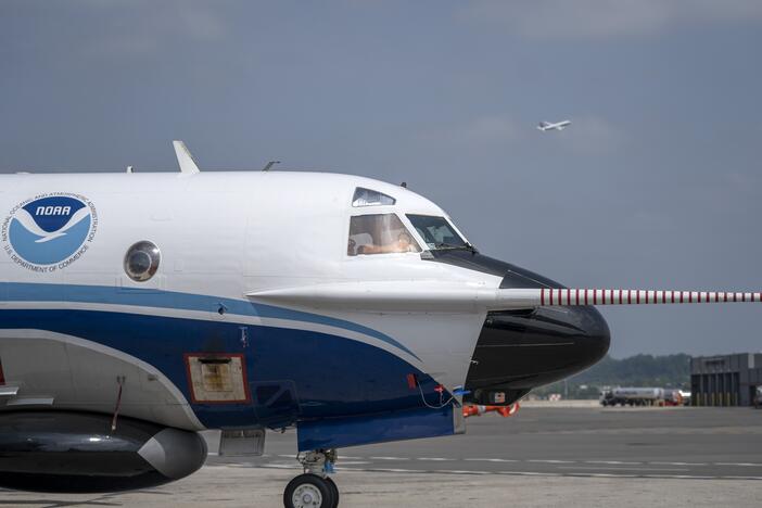 The National Oceanic and Atmospheric Administration's Orion hurricane hunter aircraft sits on the tarmac at Ronald Reagan Washington National Airport in 2022. Data gathered by the aircraft helps federal scientists issue hurricane warnings to the public.