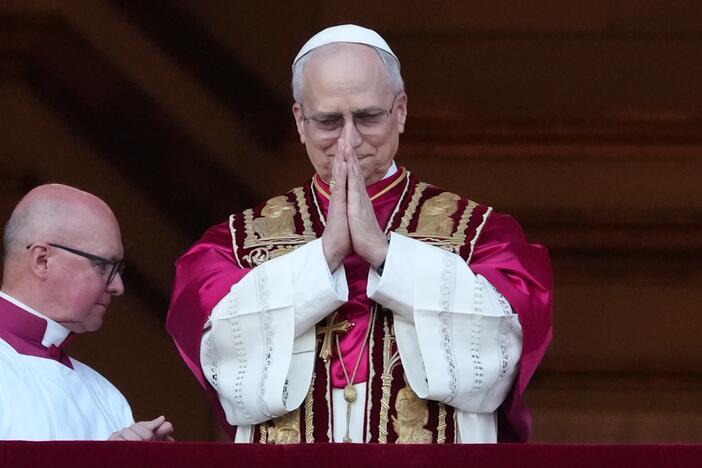 The newly elected Pontiff, Pope Leo XIV is seen for the first time from the Vatican balcony on May 8 in Vatican City, Vatican.