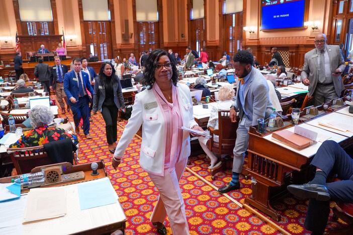 Democratic lawmakers, led by Minority Leader Carolyn Hugley, walk out of the Georgia House of Representatives last month, skipping a vote on a bill to ban gender-affirming care for inmates in state prisons.