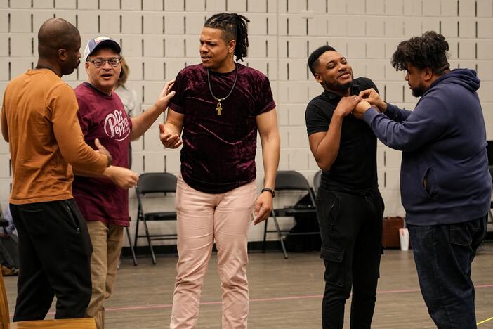 Justin Hopkins, left, Nathan Granner, David Morgans, Markel Reed and Chaz'men Williams-Ali rehearse a scene for Detroit Opera's performances of Anthony Davis' opera <em>The Central Park Five </em>on May 10, 16 and 18