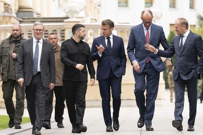 From second left, British Prime Minister Keir Starmer, Ukrainian President Volodymyr Zelenskyy, French President Emmanuel Macron, German Chancellor Friedrich Merz and Poland's Prime Minister Donald Tusk walk at the Presidential Palace in Kyiv, Ukraine, Saturday May 10, 2025.
